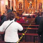 Coronavirus en A Coruña | Rezos con mascarilla
